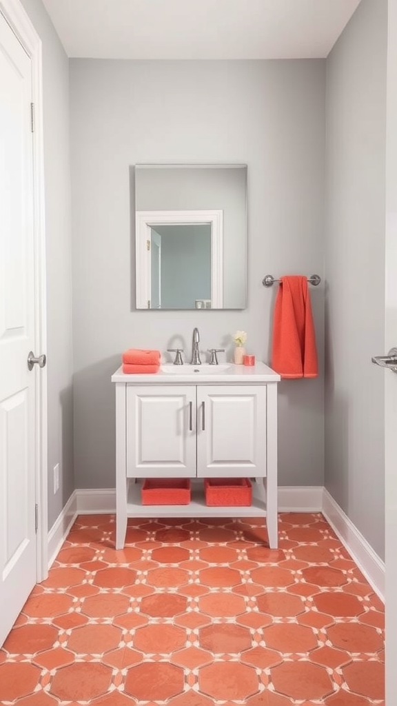 Half bathroom featuring gray walls and coral accents with patterned floor tiles.