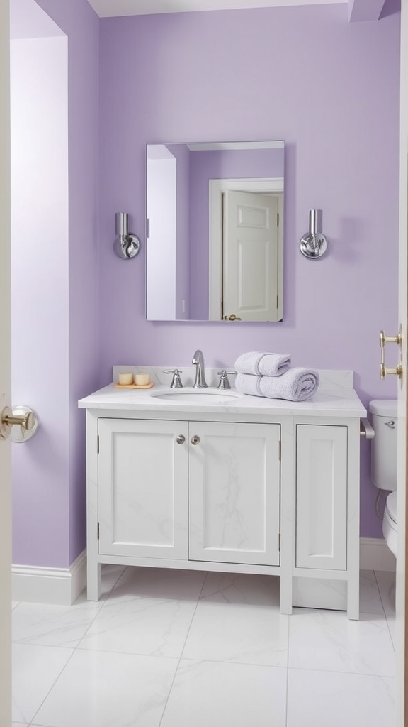 A half bathroom featuring lavender walls, white cabinetry, and neatly arranged towels.