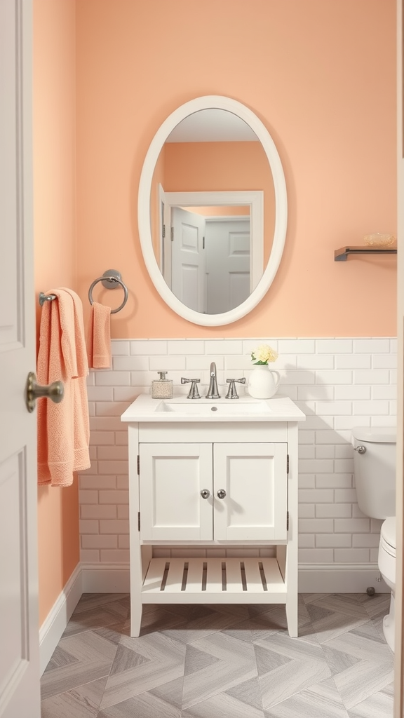 A half bathroom featuring soft peach walls, a white vanity, and gray herringbone flooring.