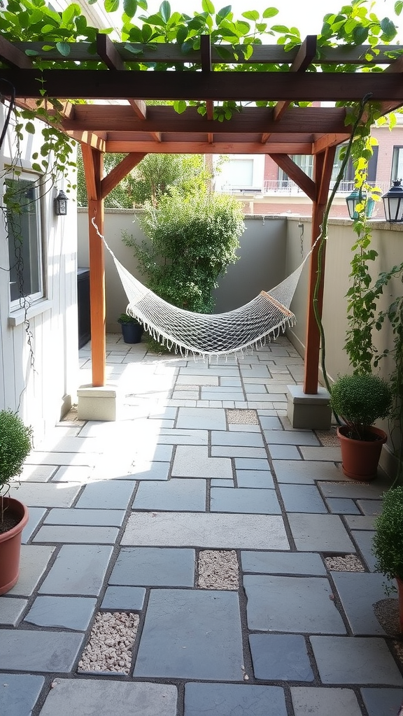 A flagstone patio with a wooden pergola and hammock surrounded by potted plants.