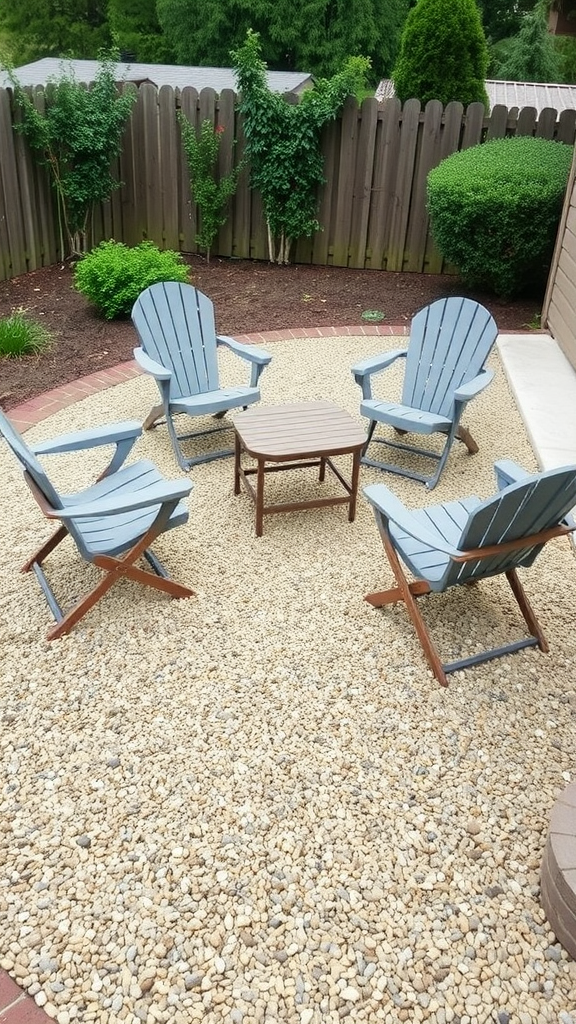 Gravel patio with folding chairs and a small table surrounded by greenery.