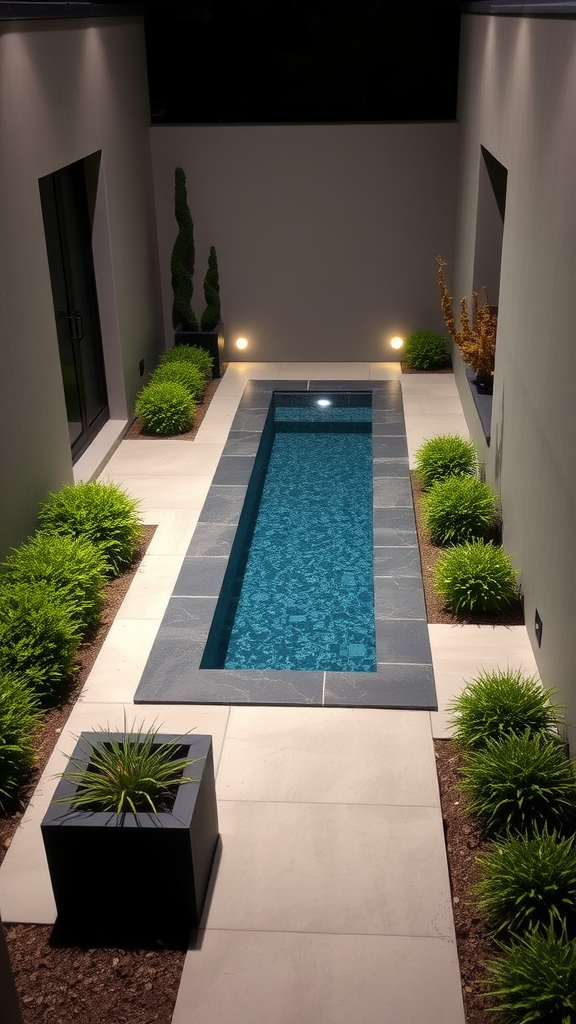 A sleek linear plunge pool surrounded by plants and modern design.